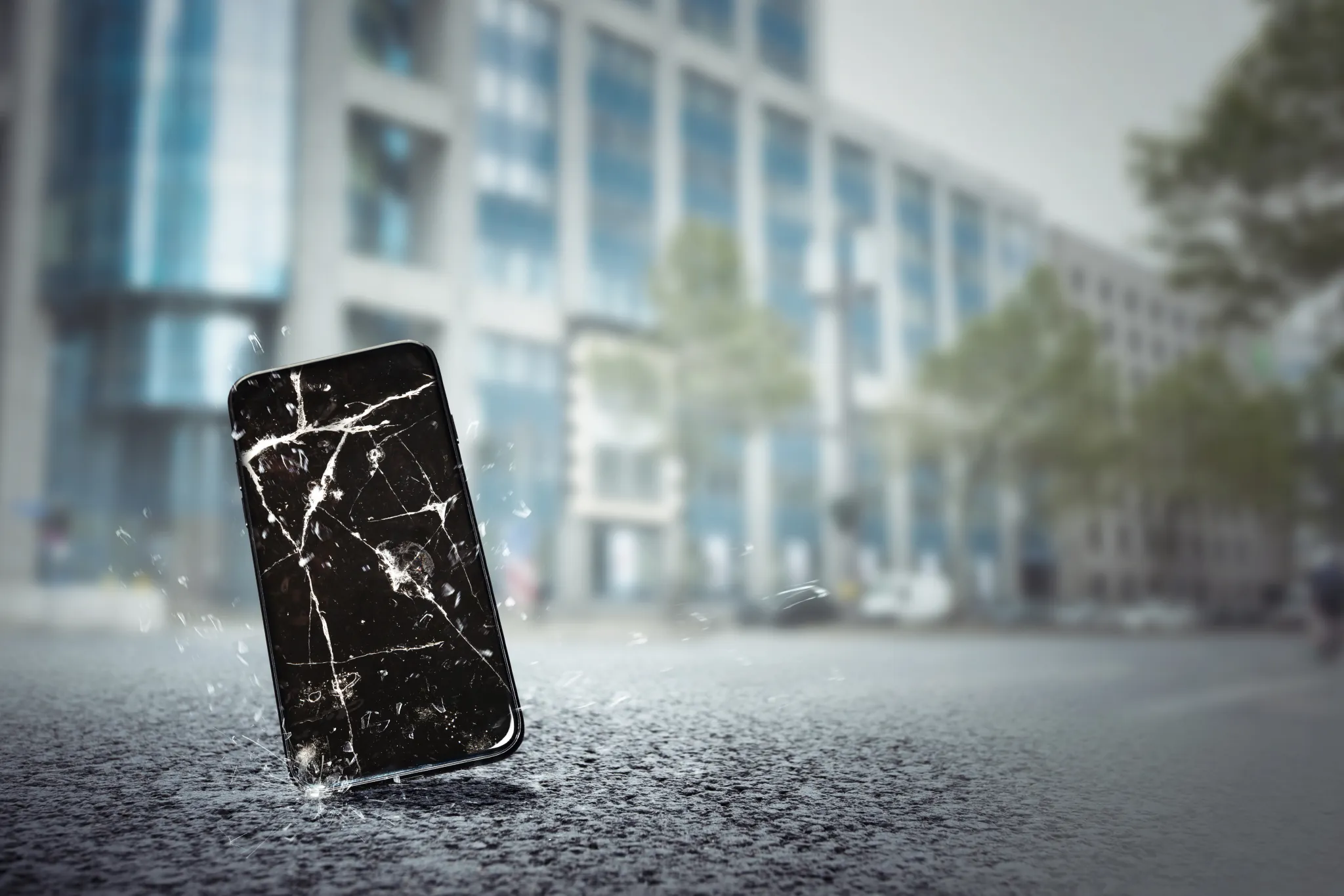 Eigenschaden Versicherung, Handy mit kaputtem Display